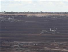 Australia trims resources revenue outlook on weaker coal, LNG exports