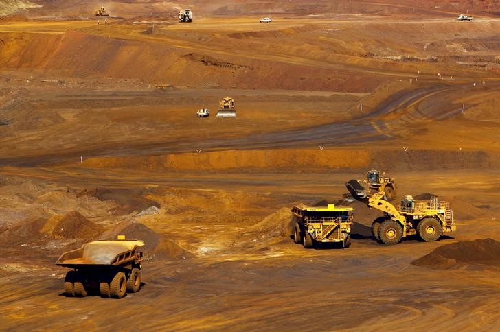 Australia`s Fortescue says iron ore production costs hit record low, shares jump
