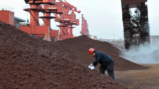 China iron ore futures pick up after factory activity unexpectedly expands