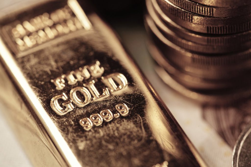 Gold price back below $1,900