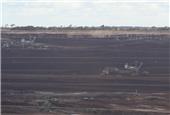 Australia trims resources revenue outlook on weaker coal, LNG exports