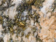 Miners turn to bacteria and other new ways to leach copper from waste rock