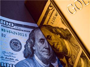 Gold price retreats as dollar rally dims precious metals appeal